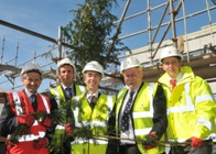 Topping out are (L to R), Paul Evans from construction company Willmott Dixon, Ryan Dixon from Architects Pascal and Watson, Professor Noel Lloyd, Vice Chancellor Aberystwyth University, Professor Wayne Powell, Director of IBERS and Jamie Lannen from project managers Davis Langdon.