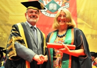 Vice President Dr Glyn Rowlands receives Dr Elaine Storkey as Fellow