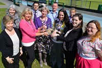 Staff members celebrate receiving the Corporate Health Standard Bronze Award which was presented to the University in March.