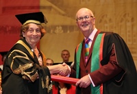 Elizabeth France, Pro Chancellor of Aberystwyth University presents an Honorary Degree to Bryn Jones