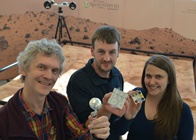 Left to right) Members of Aberystwyth University’s ExoMars Rover team Dr Laurence Tyler, Dr Matt Gunn and Dr Rachel Cross with items of the flight hardware developed for the 2018 mission at Aberystwyth University.