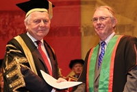 (Left to Right) Sir Emyr Jones Parry, Chancellor of Aberystwyth University presents an Honorary Doctorate to Professor Huw Cathan Davies OBE