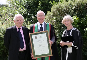 Chancellor Sir Emyr Jones Parry, Sir Evan Paul Silk KCB and Vice-Chancellor Professor April McMahon