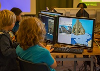 Participants learning how to code in Minecraft and ‘build’ parts of the Old College