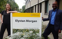 Emma Williams and Dr Ola Olusanya outside the Elystan Morgan building, Aberystwyth Law School