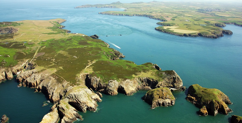 An aerial view of Ramsey island and the north Pembrokeshire coastline. Crown Copyright: The Royal Commission on the Ancient and Historical Monuments of Wales