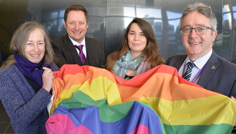 Celebrating Aberystwyth University’s rise in the Stonewall Workplace Equality Index are (left to right) Debra Croft, Director of Equality, Gary Reed, Director - Research, Business & Innovation, Ruth Fowler Communications and Equalities Officer and Professor John Grattan, Acting Vice-Chancellor.