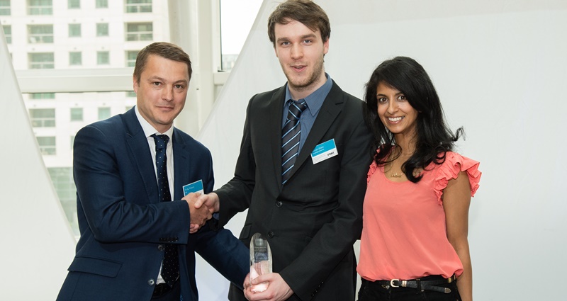 Kieran Stone (centre) receives his award from sponsor Andy Brown of FDM Group and writer and television presenter Konnie Huq.