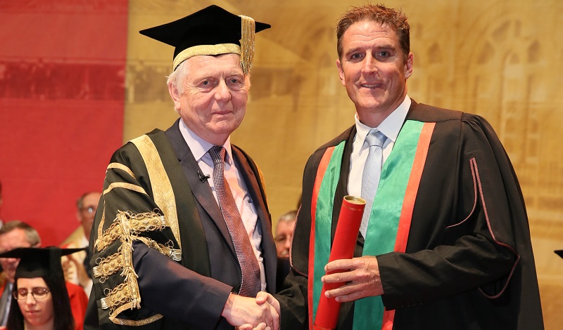 Aberystwyth University Chancellor, Sir Emyr Jones Parry, presenting wildlife television presenter and naturalist, Iolo Williams, with an Honorary Fellowship in 2015.
