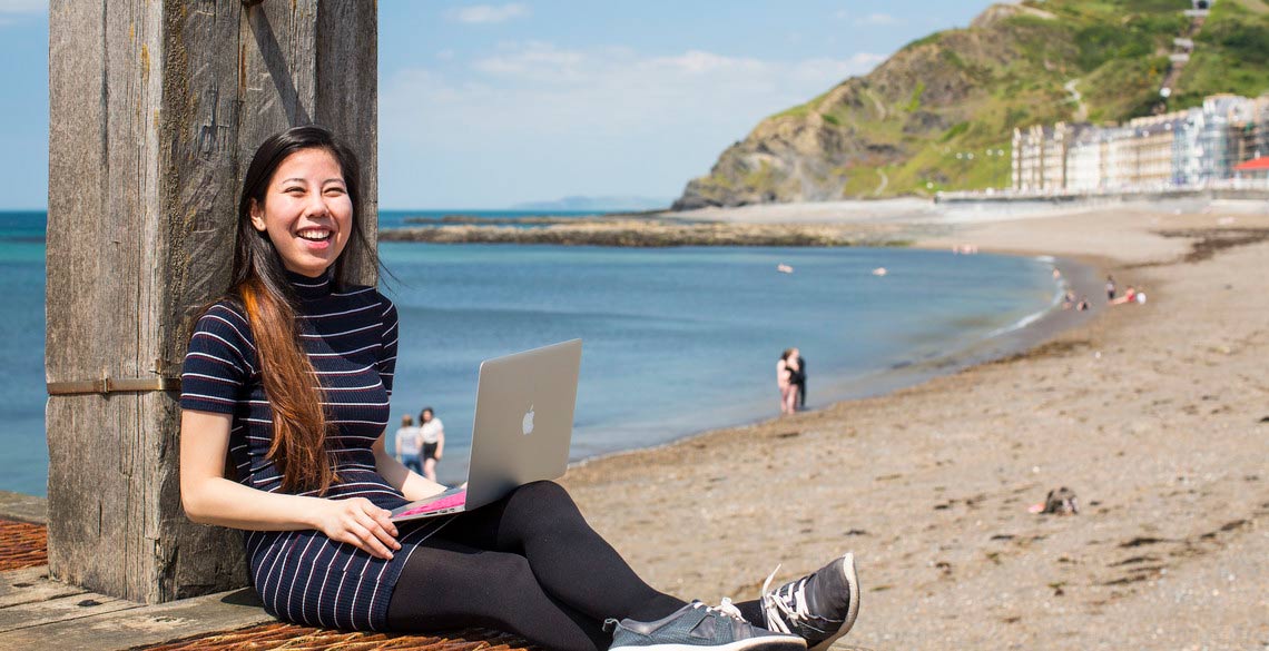 Student working on North Beach.