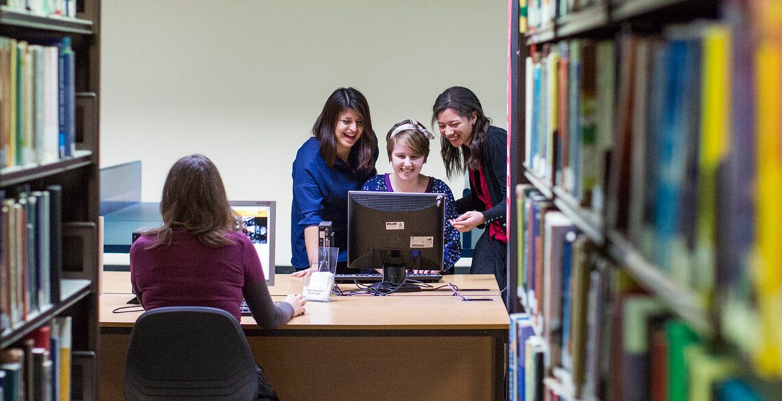 mature students working on a computer