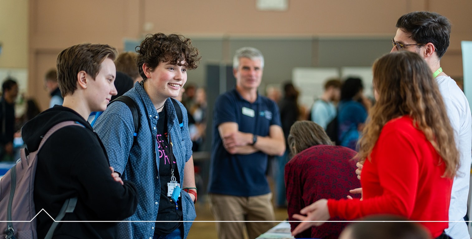 Students chatting to employers at the fair