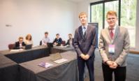 L to R: Aberystwyth students Oscar Tikadar and Jonathan Turnbull with the competition judges