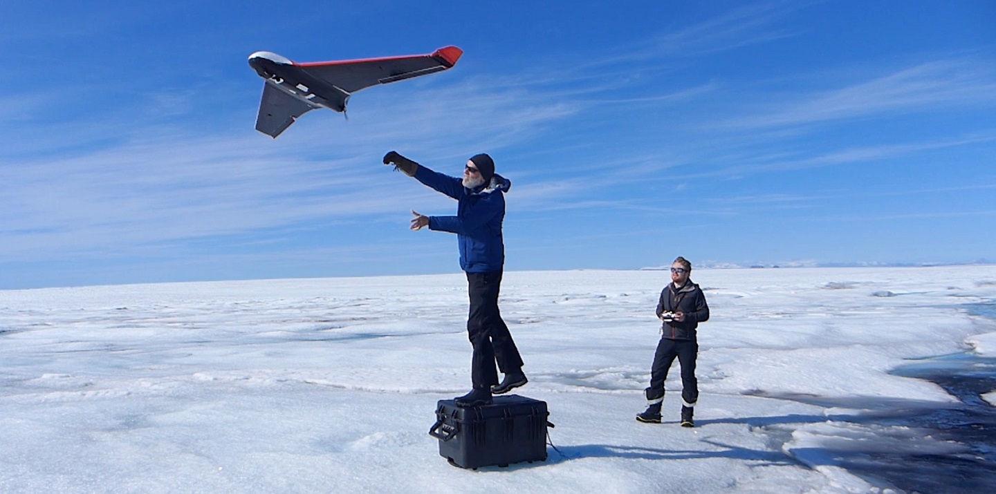 Launching a drone during the 2018 study. Custom-built drones allowed researchers to image the surface of the ice sheet in 3D, allowing the response of the ice to the lake drainage to be mapped in unprecedented resolution. Image: Tom Chudley