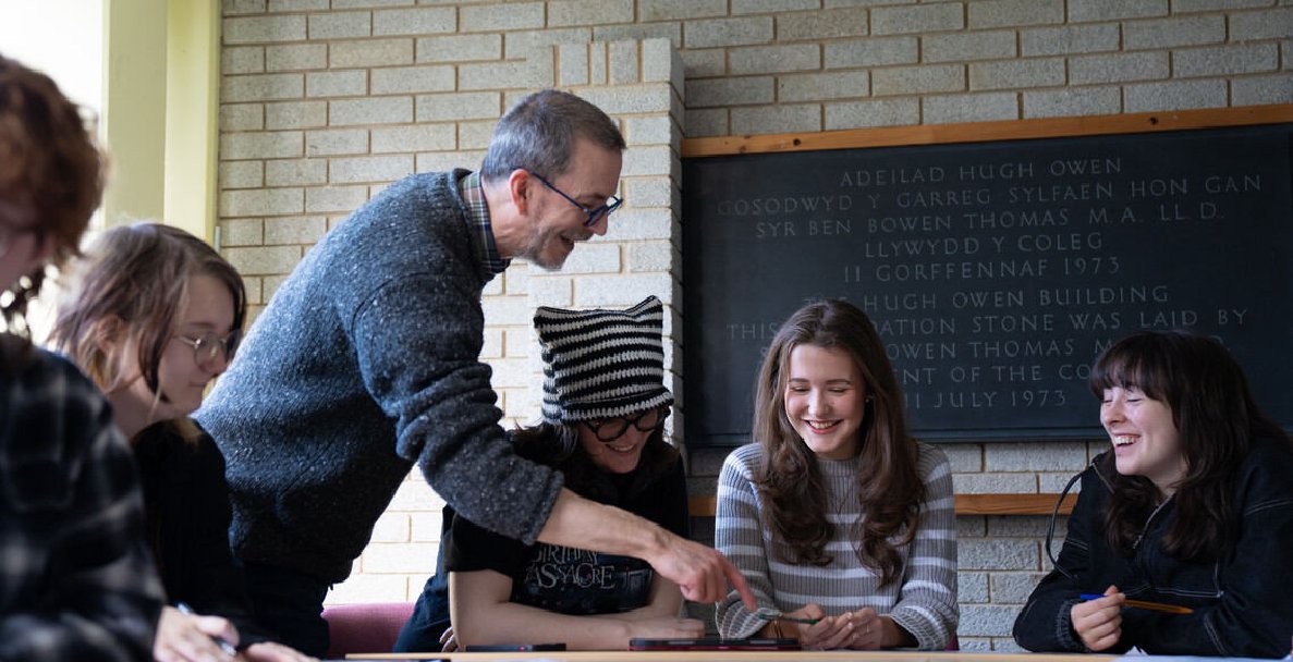 A lecturer with students