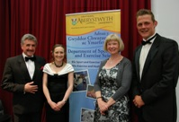 Left to Right: Gerald Davies CBE, Dr Joanne Thatcher, Professor April McMahon and Dafydd Jones.