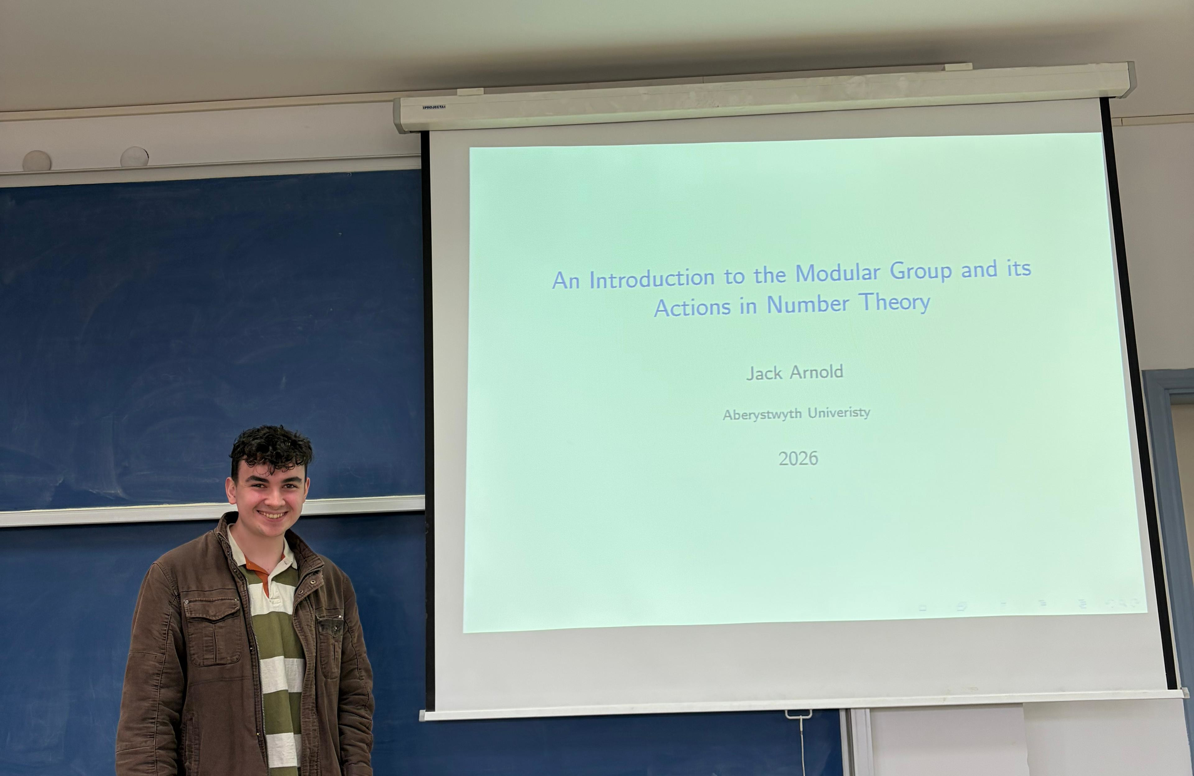Jack Arnold presenting his work