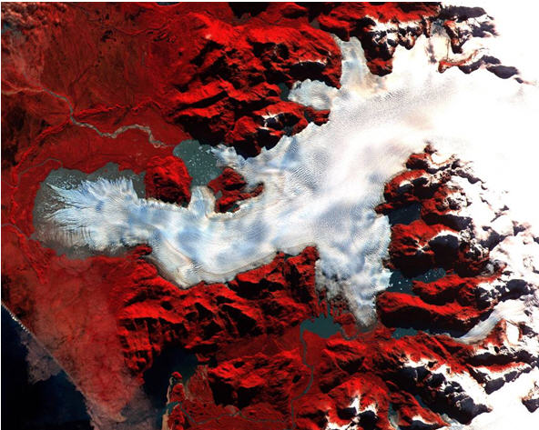 ASTER image of Glacier San Quintin, an outlet glacier on the west side of the North Patagonian Icefield. A large arcuate moraine in front of the glacier marks its maximum Twentieth Century limit. The glacier is currently receding into a proglacial lake. We have mapped the geomorphology of all the outlet glaciers of the icefield using images such as this. Image courtesy of the U.S. Geological Survey.