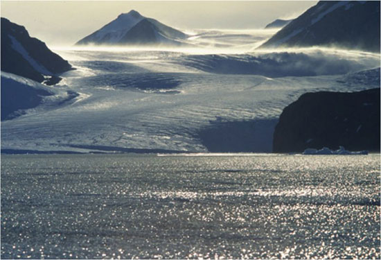 Snowstorm over Battye Glacier, Amery Oasis, east Antarctica, with frozen Radok Lake in the foreground. This is the site of work on past (Cenozoic) glaciations in association with Australian colleagues. Photo: M. J. Hambrey.