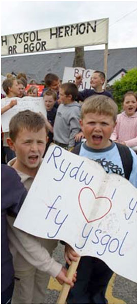 Pupils protesting to keep their school open.