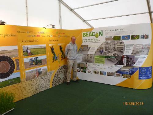 Picture of Colin Jackson next to graphics depicting IBERS Bioenergy Programme.