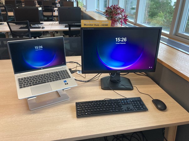 Image showing a laptop on the left with a HDMI Monitor  on the right