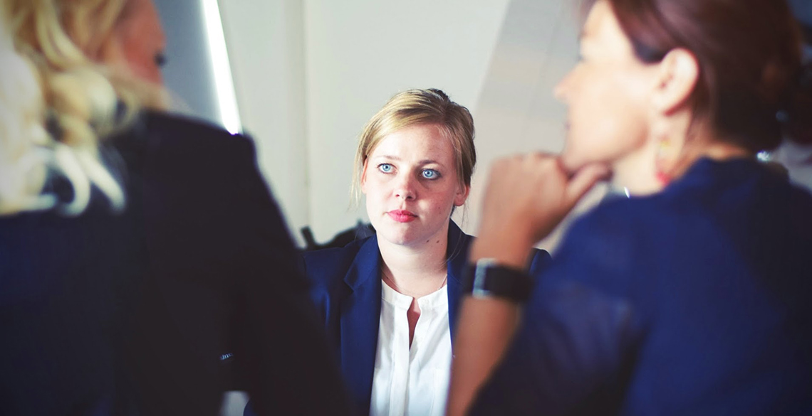 young woman in a work team meeting