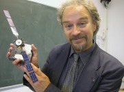 Professor Manuel Grande with a 1/40 scale model of Smart-1