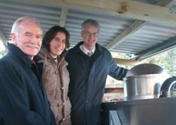 L to R: Pro Vice-Chancellor Dr John Harries, Sam Lumb, President of the Guild of Students and Mr Alan Stephens, Head of House Services with the 'Rocet Composter'