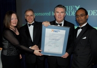 Mr Nick Perdikis, Director of the Aberystwyth School of Management and Business is presented with the MBM Accreditation by Sir Paul Judge, President of AMBA. Also pictured are Nerys Fuller-Love (far left) and Dr Teerooven Soobaroyen (far right) from the Aberystwyth School of Management and Business.