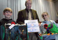 First prize winners Kirsten Davies and Peter Goodwin with Professor John Barrett