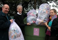 It's in the bag! Ceredigion County Council Waste Minimisation Assistant Adrian Keenan with Alan Stephens, Head of House Services at Aberystwyth University and Jenny Mace, Environment and Ethics Officer at the Aberystwyth Guild of Students.