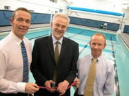 Director of Planning Mr Brian Foster (centre) officially opening the newly refurbished swimming pool. On the right is Mr Frank Rowe, Director of the Sports Centre, and on the left is Jeff Saycell, the centre's Facilities and Commercial Manager.