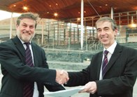 Professor Noel Lloyd, Vice-Chancellor of Aberystwyth (right) and Professor Merfyn Jones, Vice-Chancellor or Bangor University at the signing of the partnership agreement in 2006.