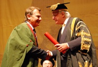 AU Vice President Wynston Roddick QC (right) welcomes Professor Clyde Williams as Honorary Fellow