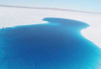 A melt lake on the ice in the arctic