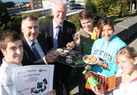 Celebrating Fairtrade University status are Jeff Smith (Involvement and Ethics officer), Mark Williams MP, Dr John Harries, Pro Vice-chancellor AU, Matt King (Sabbatical officer for Communications and Societies), Katrina Austen (Sabbatical officer for Education and Welfare) and Zoe Coombes (member of staff at the Guild shop).