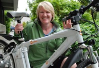 Dr Pip Nicholas and the battery powered bike she purchased as part of the Bike-to-Work scheme