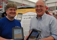 Neil Taylor (left) and Professor Chris Price at the launch of the Cwrs Mynediad app at the Eisteddfod.