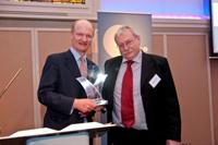 Professor Wayne Powell, IBERS Director receives the Award from David Willetts MP Minister for Universities and Science.  Copyright Andrew Davis, John Innes Centre.