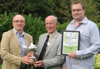 Photo, left to right: Dr. Athole Marshall IBERS receiving his Award from BGS President John Downs, with Dr. Richard Hayes, IBERS Grass breeder.