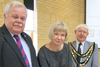 Cllr Paul Hinge, Professor April McMahon, Vice Chancellor of Aberystwyth University signing the Ceredigion Armed Forces Community Covenant and Councillor John Adams-Lewis, Chairman of Ceredigion County Council