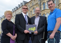 Marking the transfer of the Dark Fibre Network to Aberystwyth University are (L to R) Christine Featherstone, Business Development Manager at Pinacl Solutions, Tim Davies, Director of Information Services at Aberystwyth University, Rob Bardwell, Managing Director Pinacl Solutions, and Hefin Jones, ICT Infrastructure Group Manager at Aberystwyth University.