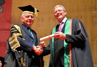 Sir Emyr Jones, President of Aberystwyth University, presents Dr John Sheehy as a Fellow of Aberystwyth University.