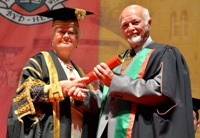 Aberystwyth University Vice-President, Gwerfyl Pierce Jones (left), presenting D Geraint Lewis as Fellow of Aberystwyth University