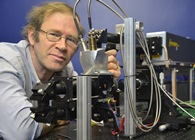 Dr Dave Langstaff with the levitating furnace