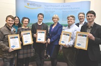 Exemplary Course Awards 2014/15: Left to right:  Dr Jarrett Blaustein (Law and Criminology), Mary Jacob (Exemplary Course Awards organiser), Dr Rosemary Cann (Education and Lifelong Learning), Dr Rupert Marshall (IBERS), Professor April McMahon (Vice-Chancellor), Neil Taylor (Computer Science), Professor John Grattan (Pro Vice-Chancellor Student Experience and International) and Dr Adam Vellender (Mathematics).