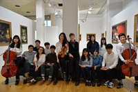 Students from the Korea Wales International Christian School who are currently studying at Aberystwyth University, with the director of the University’s International English Centre, Rachael Davey.