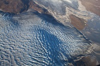 Crevassed glacier terminus in West Greenland. Credit: Sam Doyle