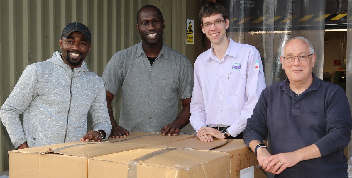 L to R: Aberystwyth University PhD students Expo Otu and Edore Akpokodje, David Lowe, Commercial Manager at Cambrian Printers, and Professor Chris Price, from the Department of Computer Science at Aberystwyth University.